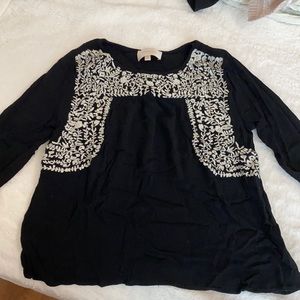 Black 3/4 sleeve dressy top with white embroidery